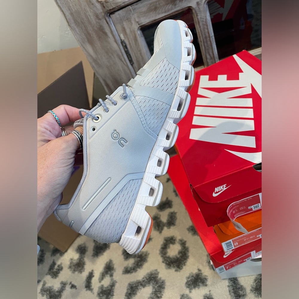 On clouds.  Worn twice.  Size 7.5 women.  Grey slip on